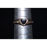 9ct Gold ring set with black heart shaped stone Si