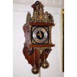 Dutch wall clock with atlas finial