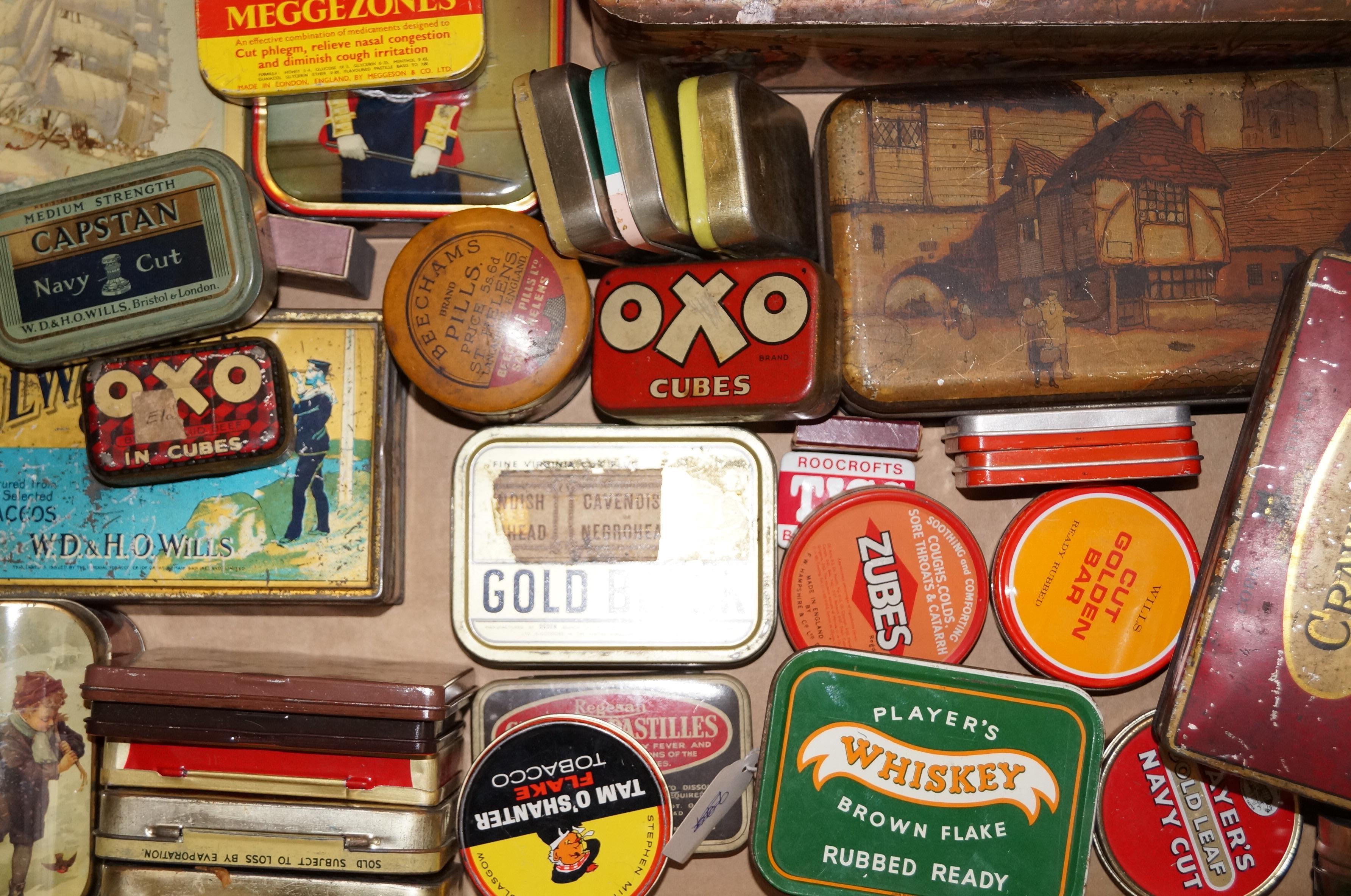 Box of vintage cigarette tins