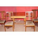 Oak drawer leaf dining table with 4 chairs