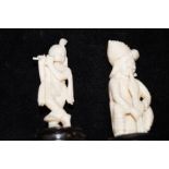 2 Ivory figures on plinths