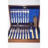 Cased part set of fish eaters with serving knife &