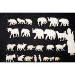 Group of ivory figures elephants & others (some fo