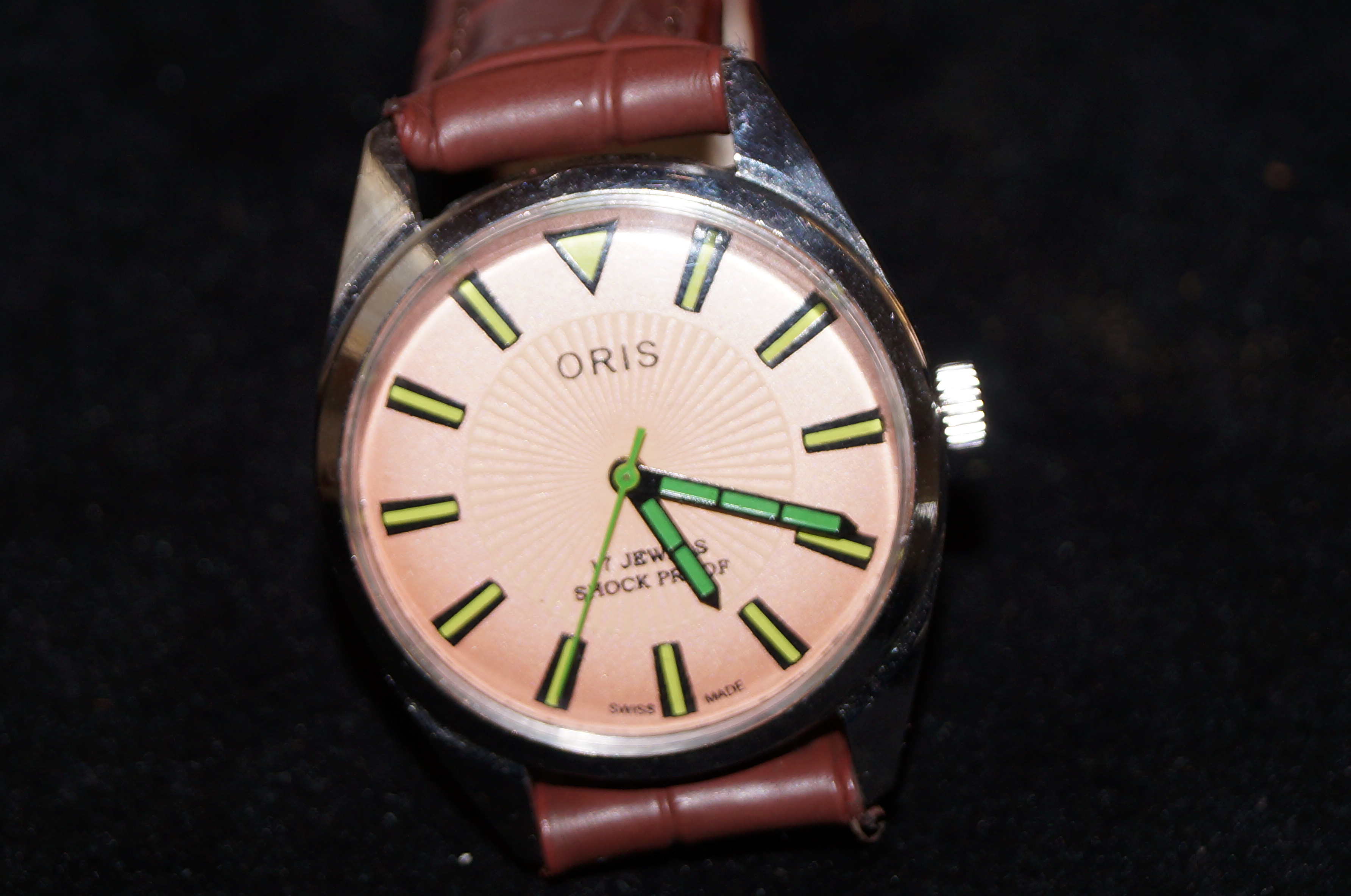 Oris 1982 wristwatch with salmon pink face & green