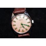 Oris 1982 wristwatch with salmon pink face & green