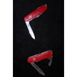 2 Victorinox Swiss army knives
