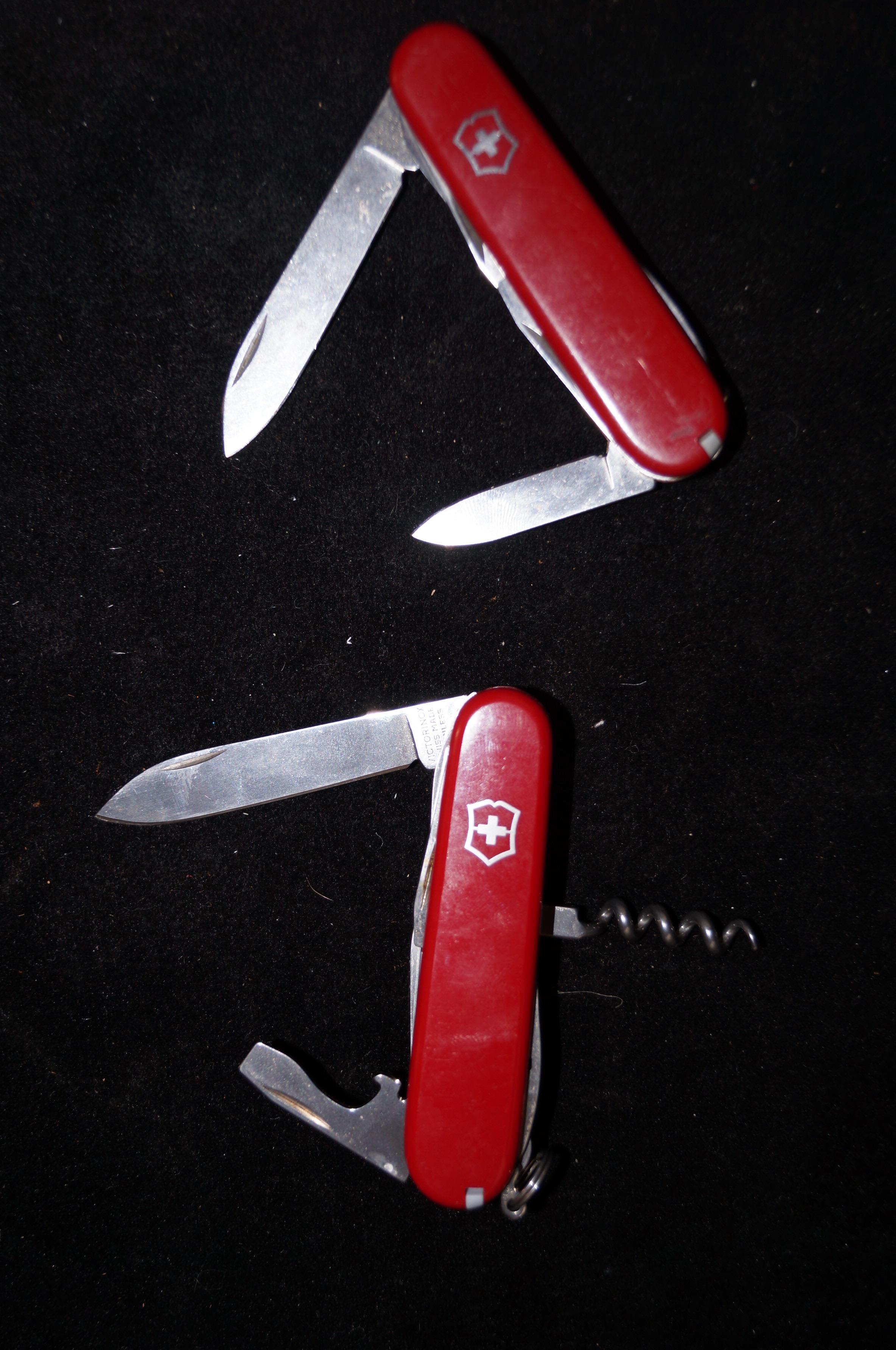 2 Victorinox Swiss army knives