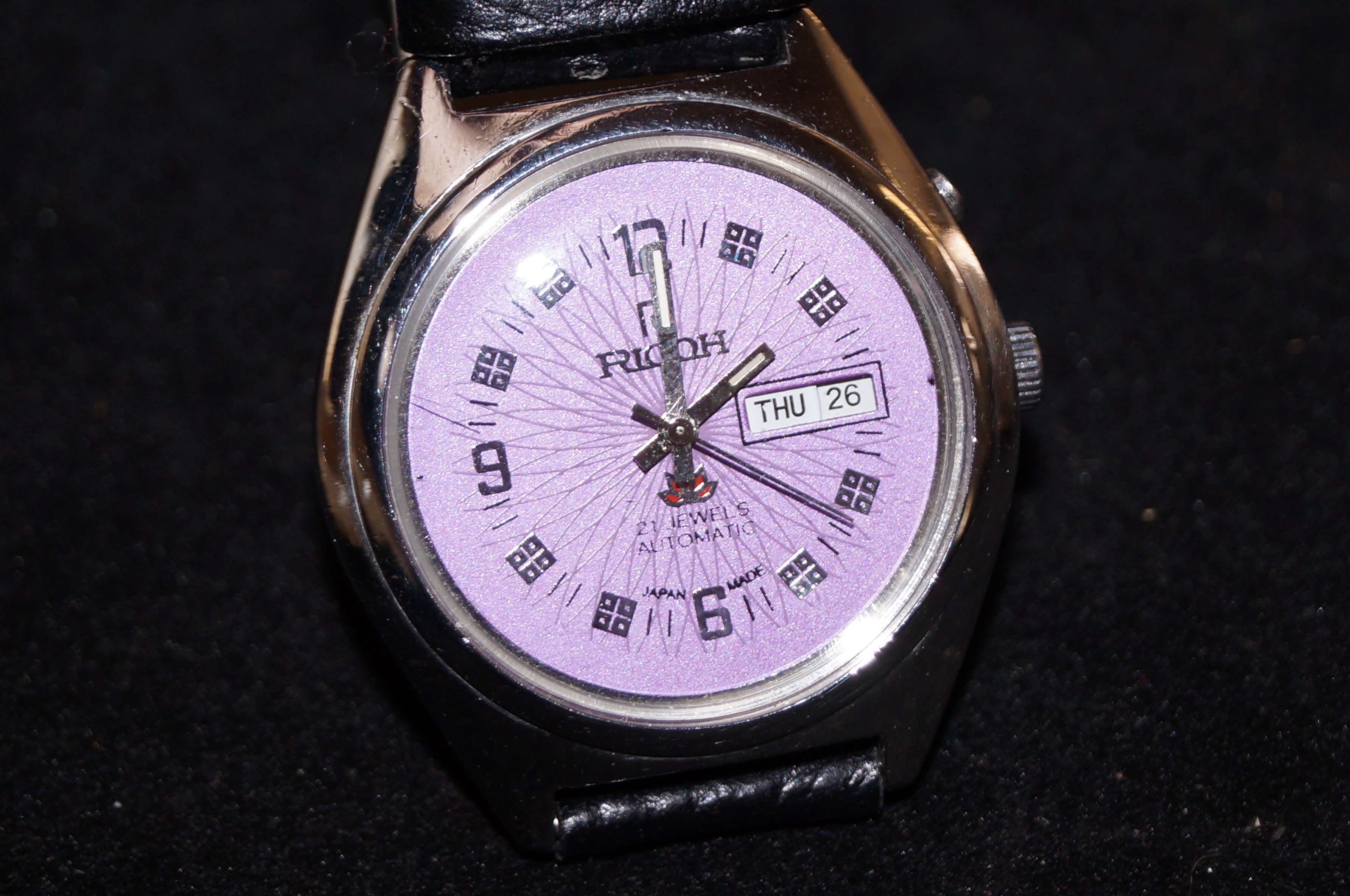 1976 Ricoh wristwatch with purple dial day/date