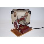 Cased Essex miniature sewing machine