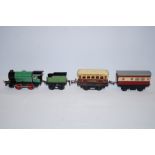 4 Boxed Hornby train & coaches 1 tender