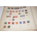 Early stamp album with many Victorian British & wo