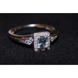 9ct White gold ring set with aquamarine & diamond