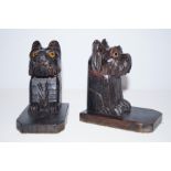 Pair of black Forrest bookends in the form of dogs