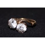 9ct Gold dress ring set with 2 white gem stones Si