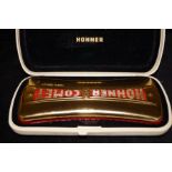Hohner comet mouth organ with original case