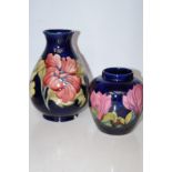 Moorcroft ginger jar together with a Moorcroft vas