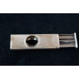 Silver engine turned cigar cutter