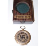 Cased compass with swastika to rear