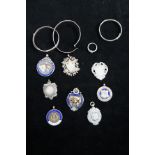 Collection of silver badges & fobs together with 3