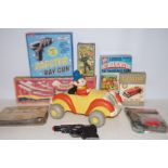 Group of vintage toy items to include a Noddy car,