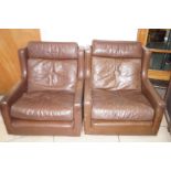 Pair of leather arm chairs by Minty