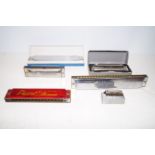 Group of vintage harmonicas to include a miniature
