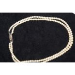 Twin strand of cultured pearls with silver clasp