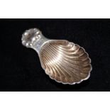 Silver scallop caddy spoon by Joseph Rodgers