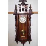 Vienna style wall clock in mahogany and rosewood,