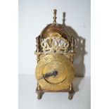 Smiths 8 day brass lantern clock. Height 19cm.