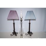 Pair of wrought iron table lamps together with a c
