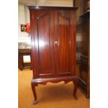 Early 20th century mahogany cabinet on cabriole su