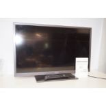 Hitachi 32 inch flat screen TV with remote (Tested