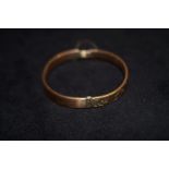 9ct Gold bangle. Weight 10.5 grams (metal core)