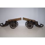 Pair of cast iron cannons. Length 48cm