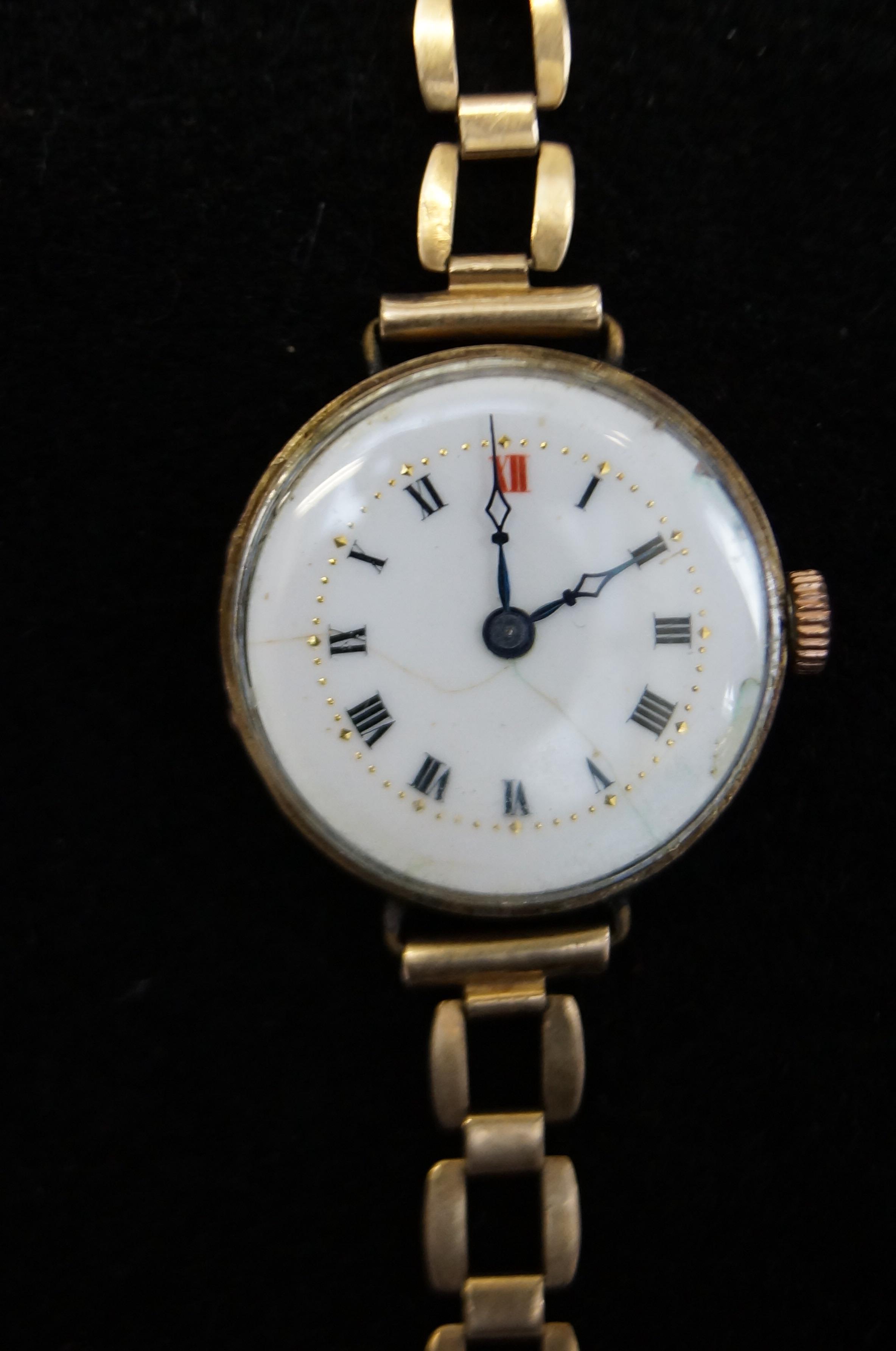 9ct Gold cased ladies wristwatch with 9ct Gold str