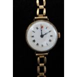 9ct Gold cased ladies wristwatch with 9ct Gold str