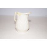 A Belleek cream jug