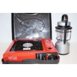 Camping stove together with light