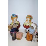 2 Export ware figures together with a pair of Staf