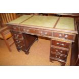 Twin pedestal writing desk with green leather top