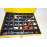 Box of model railway accessories