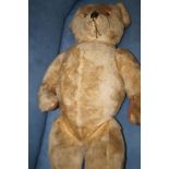 Very large straw filled teddy bear possibly Chad v