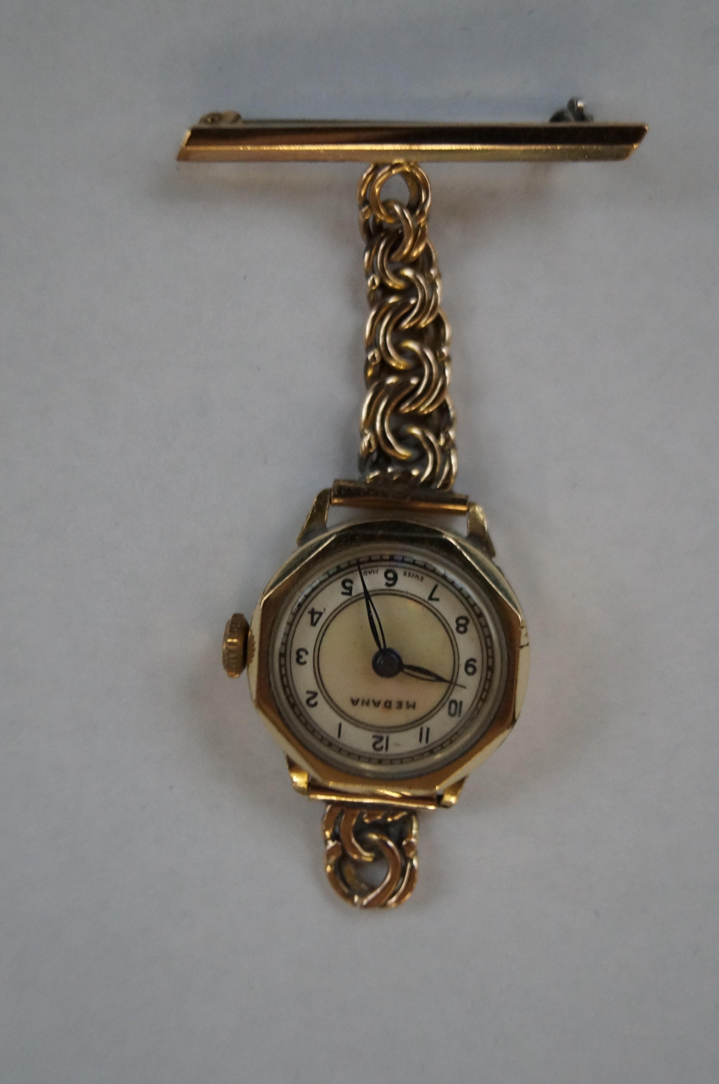 Ladies yellow metal fob watch by Medana Possibly g