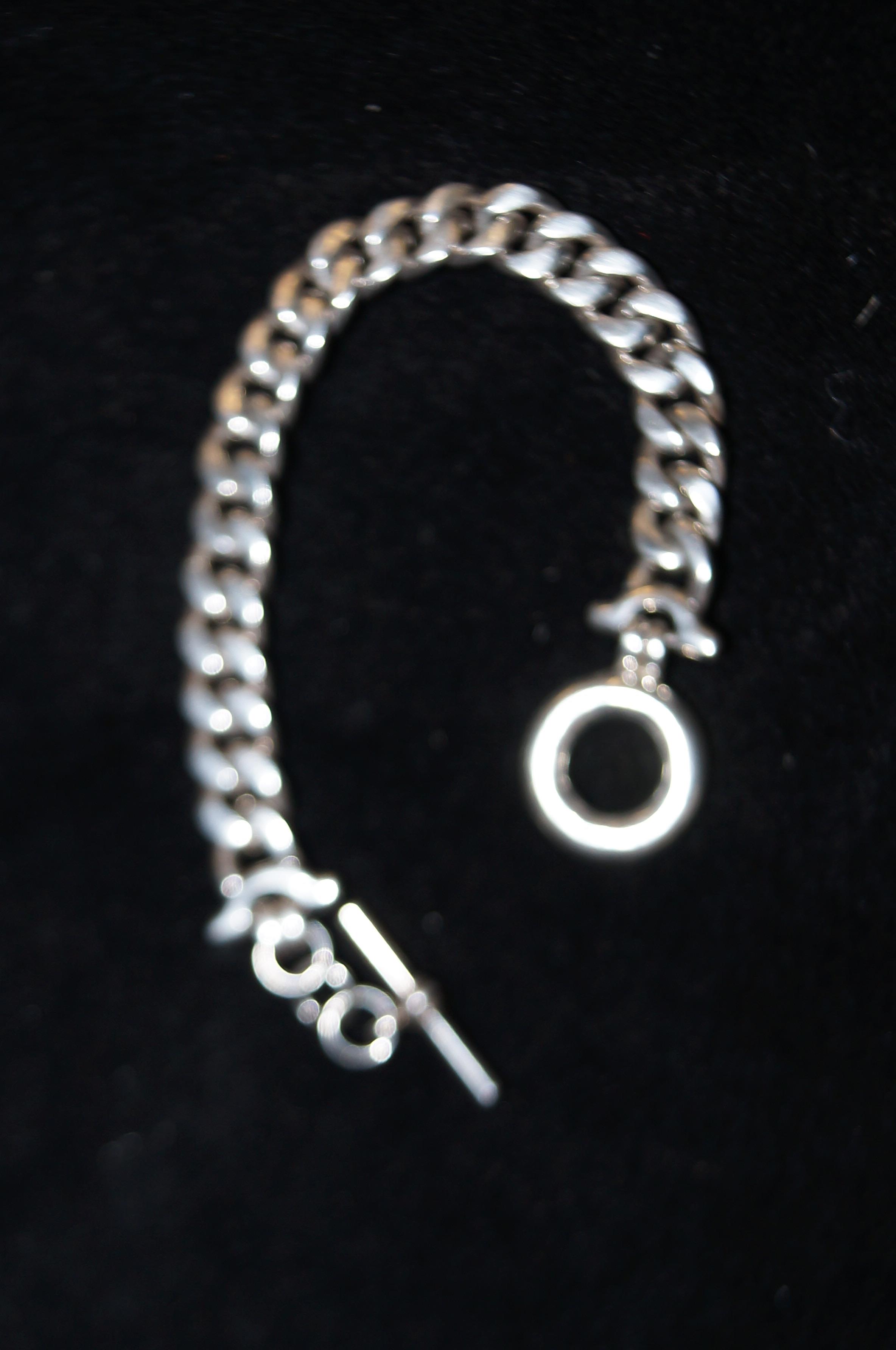 White metal chain with T-bar possibly silver Weigh