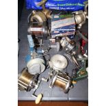 Box of assorted fishing reels