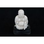 Oriental bone Buddha