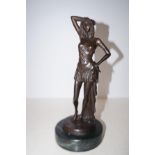 Bronze figure of lady on a marble base signed Heig