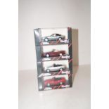 4 Mint & boxed corgi detailed cars collection