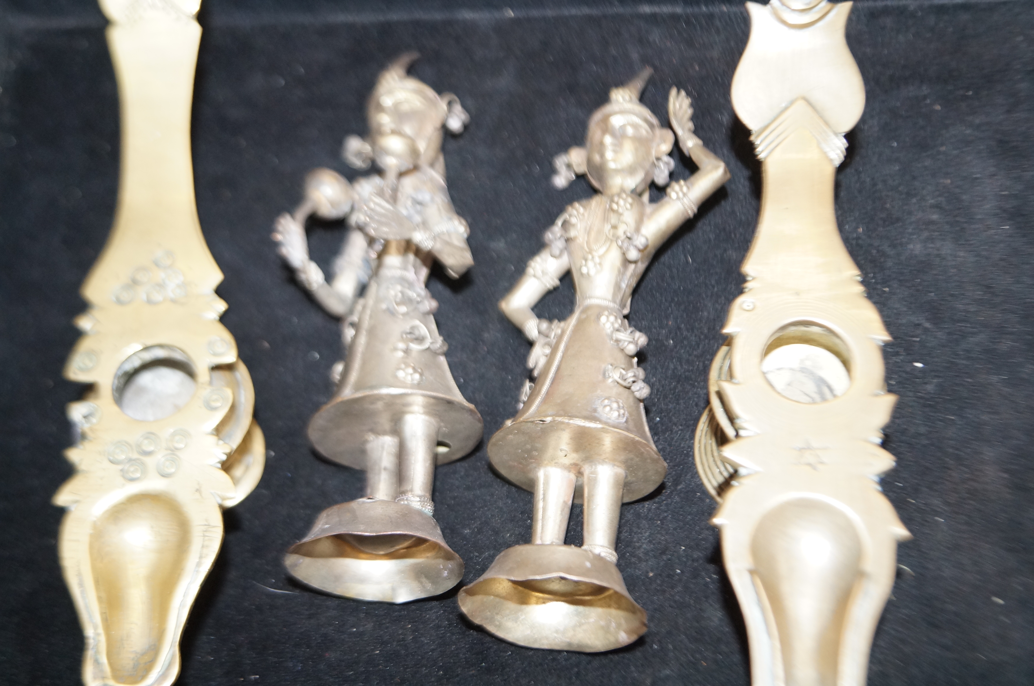 2 White metal oriental figures together with 2 bra